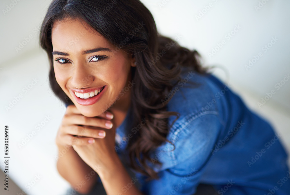 Portrait, face and happy with a black woman in her home to relax alone on the weekend from above. Smile, freedom and sofa with an attractive young female resting in her house living room Portrait, face and happy with a black woman in her home to relax alone on the weekend from above. Smile, freedom and sofa with an attractive young female resting in her house living room