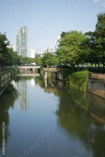 low angle view of singapore city buildings on river side 