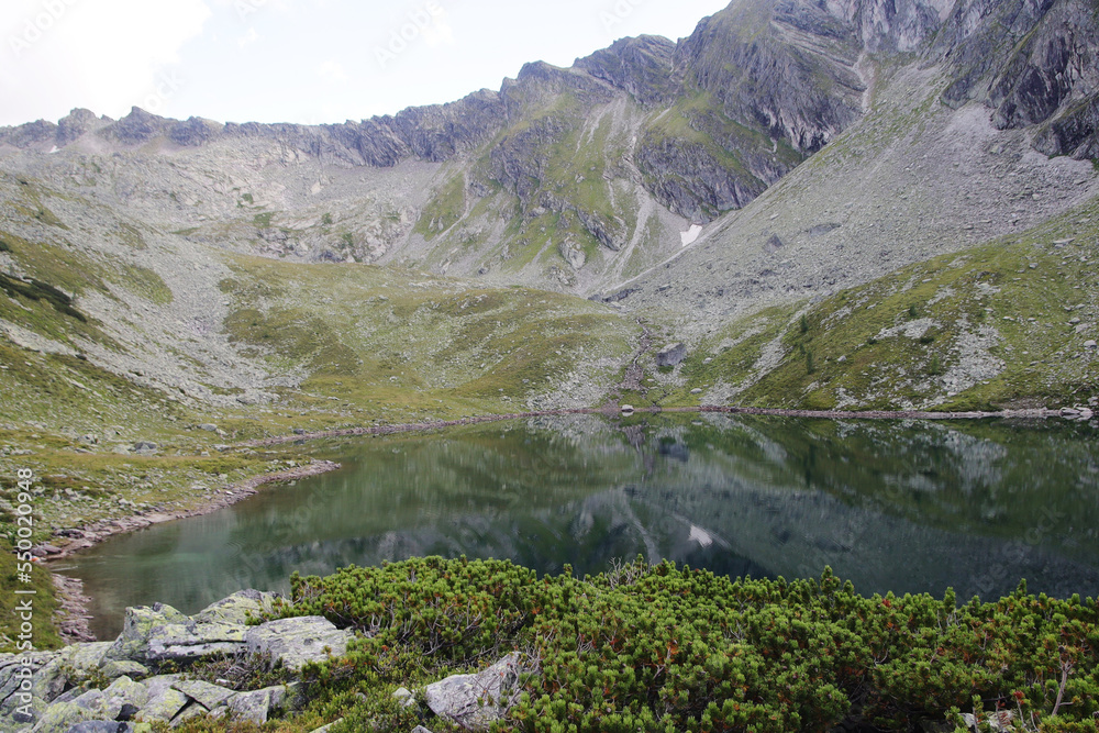 Palfner lake in Gastein valley, the view from Graukogel, Austria Palfner lake in Gastein valley, the view from Graukogel, Austria