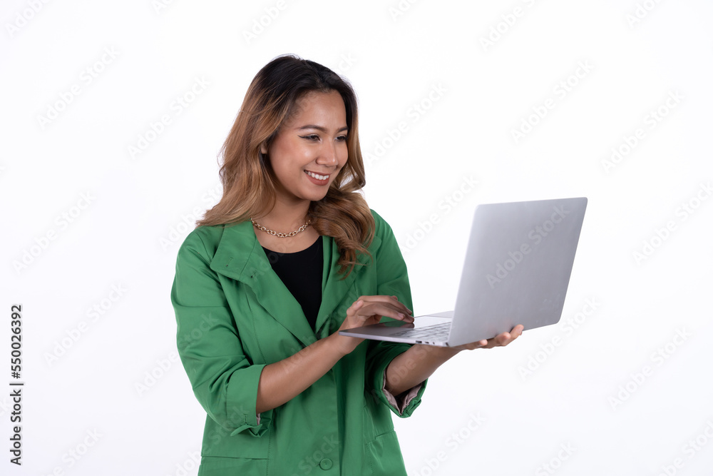 Business asian woman is holding laptop computer on white Studio background. Business asian woman is holding laptop computer on white Studio background.