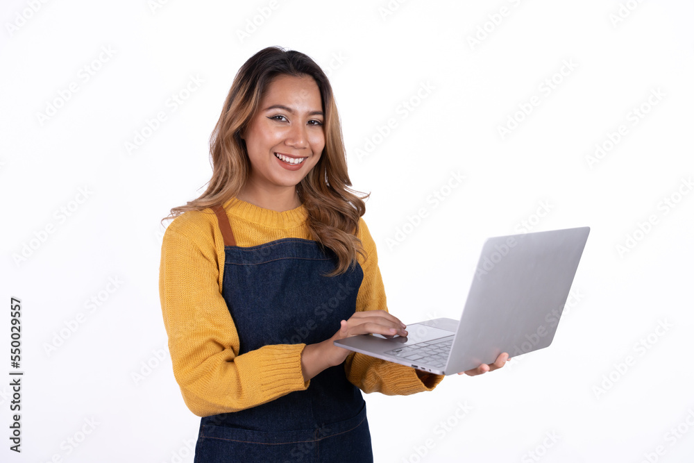 Asian woman entrepreneur or shop owner holding a laptop computer with an excited face. isolate on a white background. Asian woman entrepreneur or shop owner holding a laptop computer with an excited face. isolate on a white background.