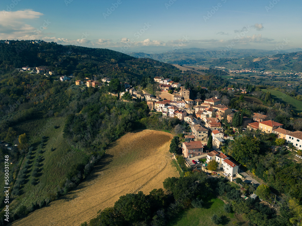 Obraz premium Italy, November 26, 2022: aerial view of the village of Colbordolo in the province of Pesaro and Urbino in the Marche region