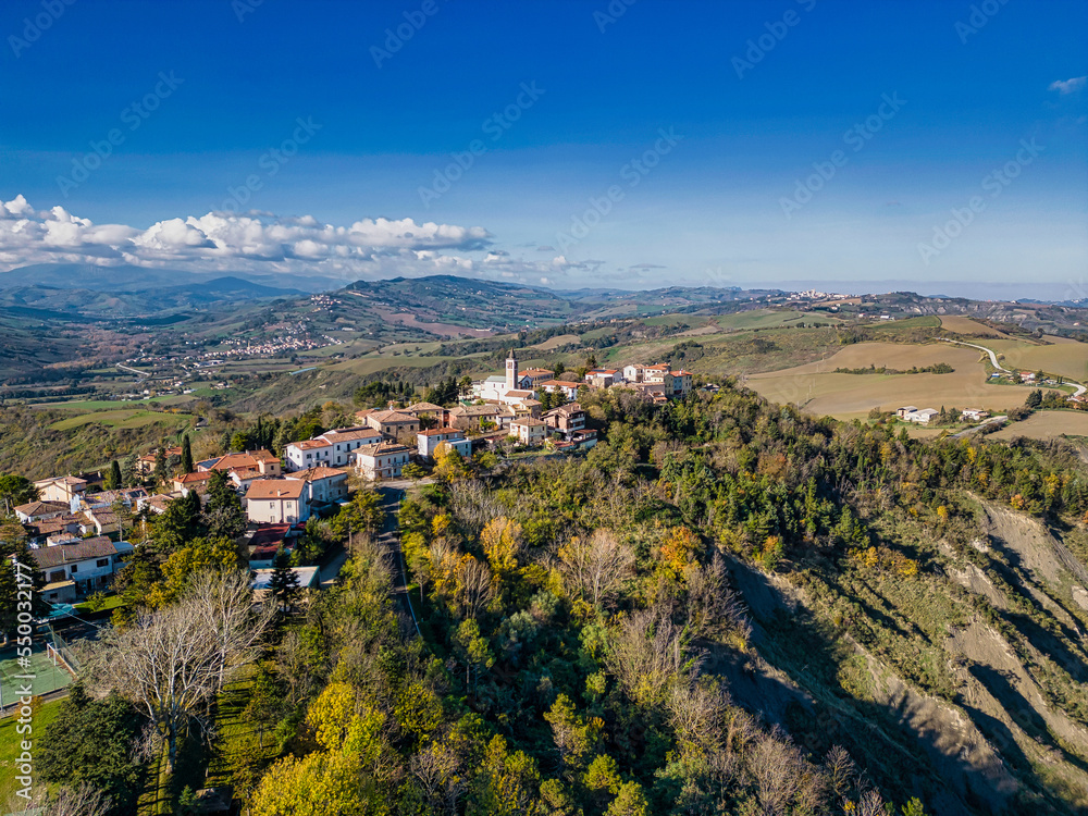 Italy, November 26, 2022: aerial view of the village of Montecalvo in Foglia in the province of Pesaro and Urbino in the Marche region