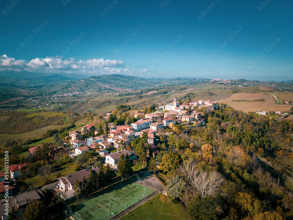 Italy, November 26, 2022: aerial view of the village of Montecalvo in Foglia in the province of Pesaro and Urbino in the Marche region