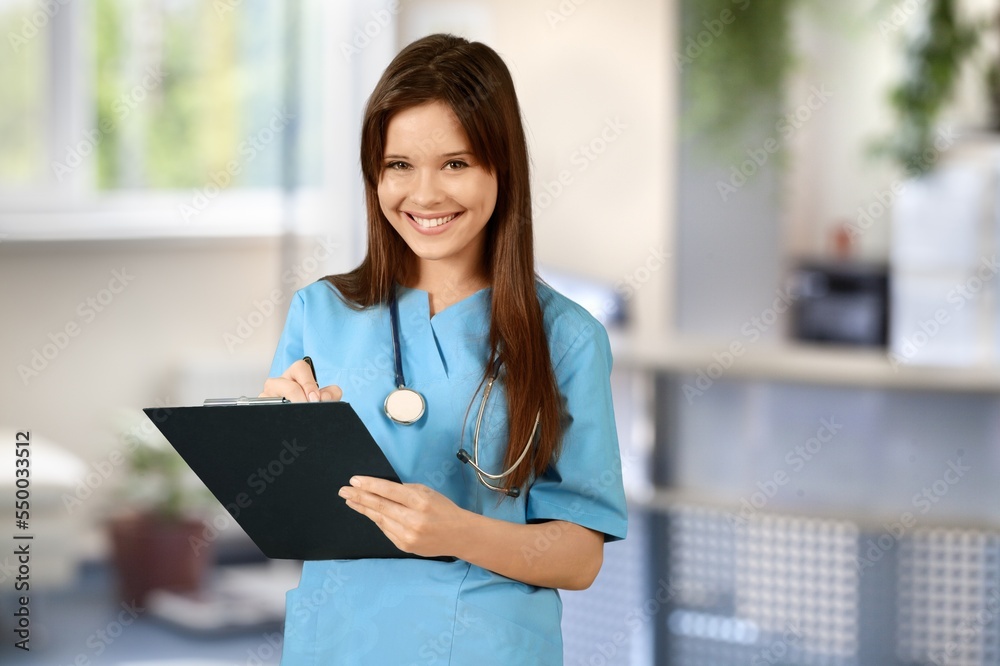 Young doctor hold digital tablet in clinic Young doctor hold digital tablet in clinic