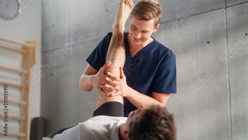 Close Up of a Sportsman Patient Undergoing Physical Therapy to Recover from Surgery and Increase Mobility. Physiotherapist Works on Specific Muscle Groups or Joints to Rehabilitate from Injury.