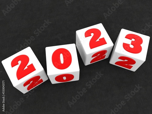 New and old year concept on white toy blocks on black background