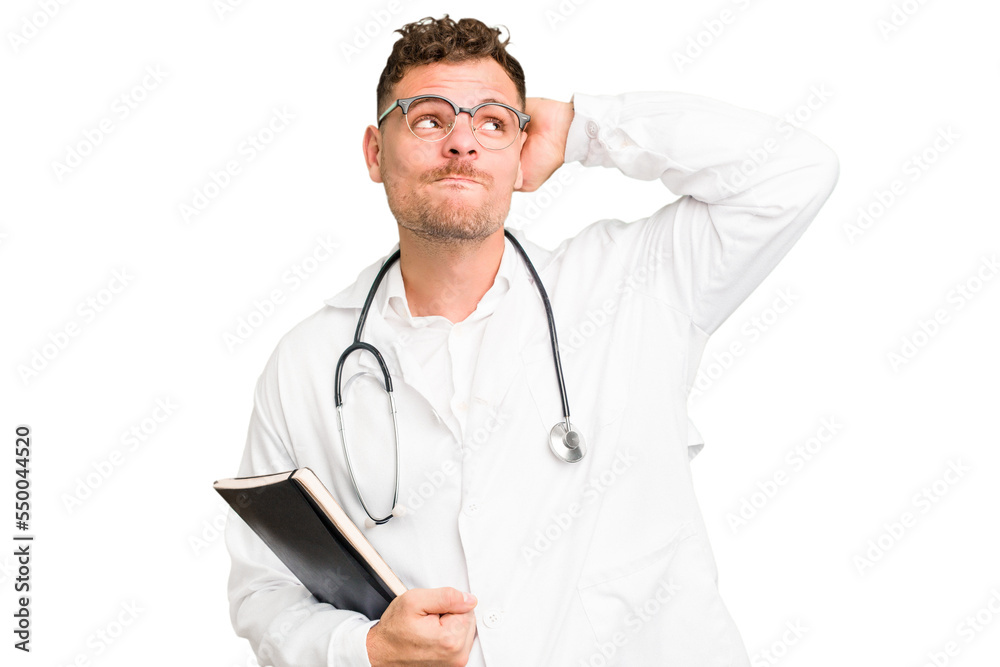 Young doctor caucasian man holding a book isolated touching back of head, thinking and making a choice. Young doctor caucasian man holding a book isolated touching back of head, thinking and making a choice.