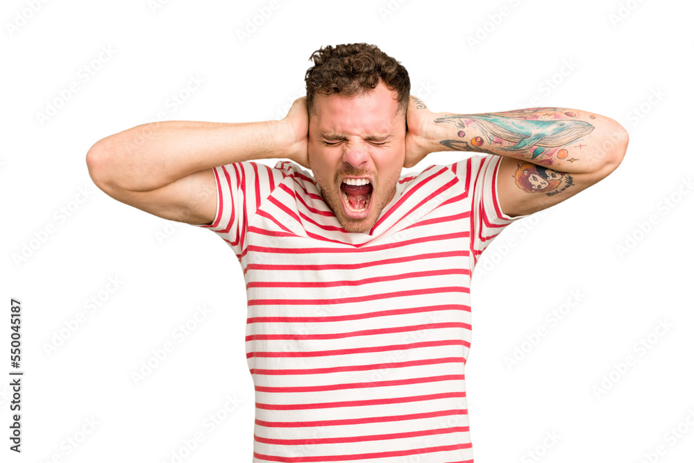 Young caucasian handsome man isolated covering ears with hands trying not to hear too loud sound. Young caucasian handsome man isolated covering ears with hands trying not to hear too loud sound.