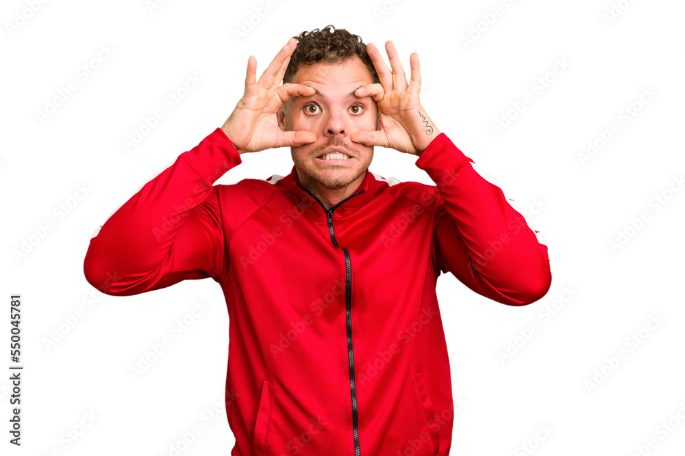 Young caucasian handsome man isolated keeping eyes opened to find a success opportunity. Young caucasian handsome man isolated keeping eyes opened to find a success opportunity.
