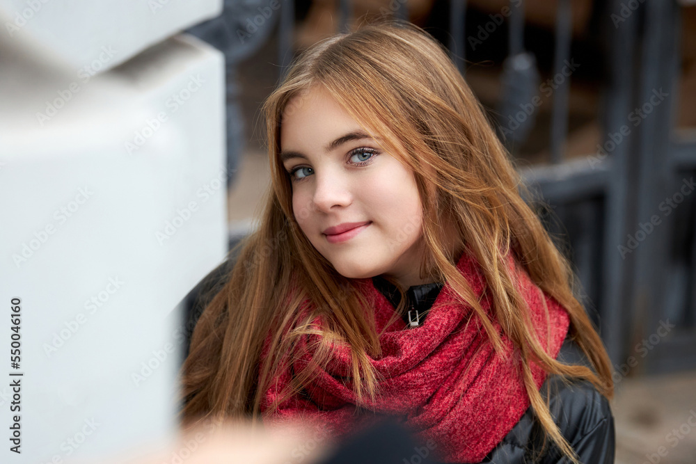 portrait of a young girl with long hair and a red scarf portrait of a young girl with long hair and a red scarf