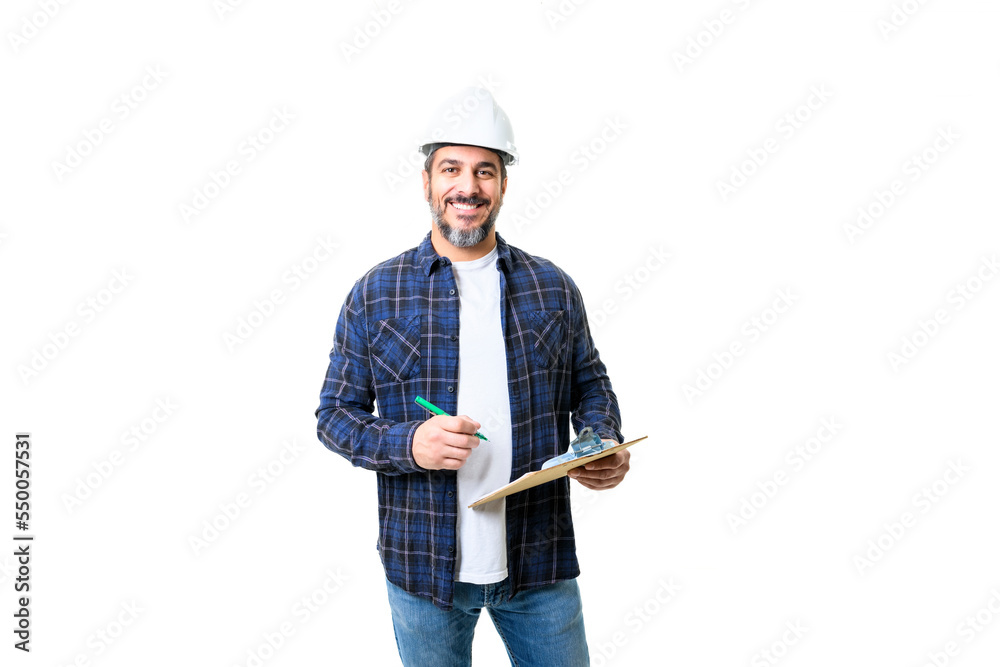 Construction Home Inspector Reviews Documents on studio white background with white helmet Construction Home Inspector Reviews Documents on studio white background with white helmet