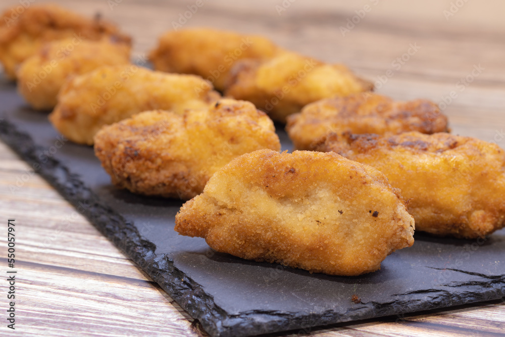 View of a plate of appetizers with croquettes View of a plate of appetizers with croquettes
