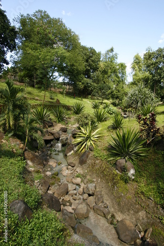 Small downflowing stream in a picturesque landscape photo