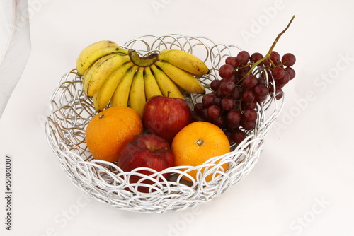 Fototapeta Naklejka Na Ścianę i Meble -  Metal looping table basket with various fruits