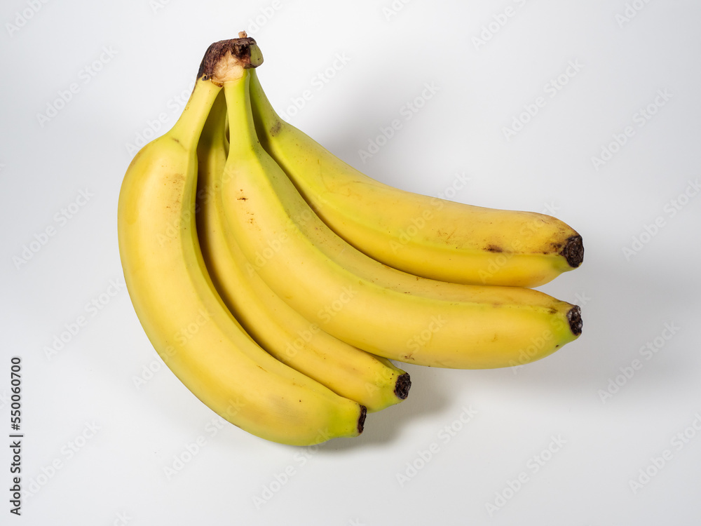 Banana on a white background. Ripe bananas on a light background.