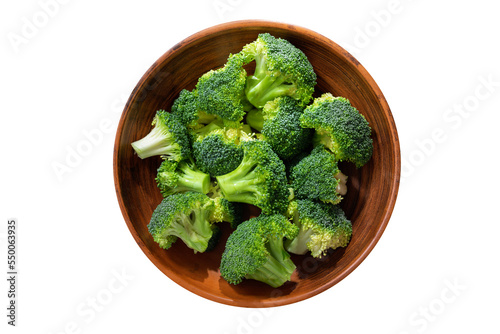 Bowl of fresh broccoli florets isolated on transparent background, top view