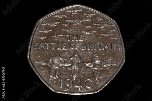 Closeup macro image of a circulated commemorative 2015 Battle of Britain 50p piece on a black background