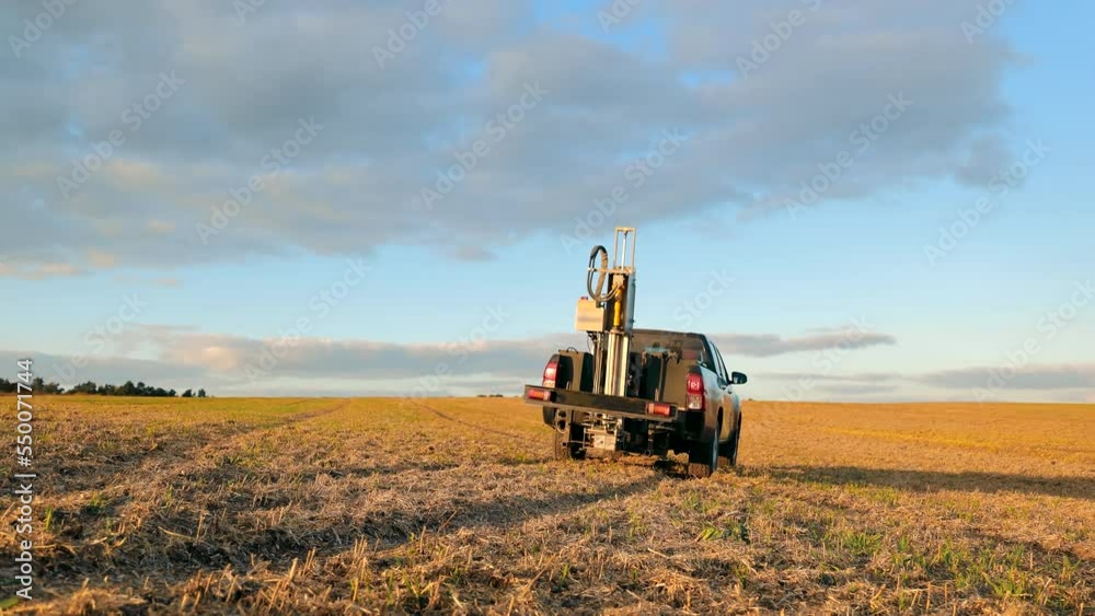 A car that automatically takes soil samples in the field. Soil-centric technology of soil sampling