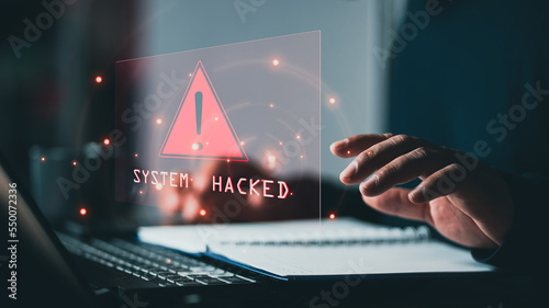 Fotografija System hacked alert after cyber attack on computer network