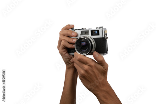 Bilde på lerret Male hands holding an old vintage camera with no background