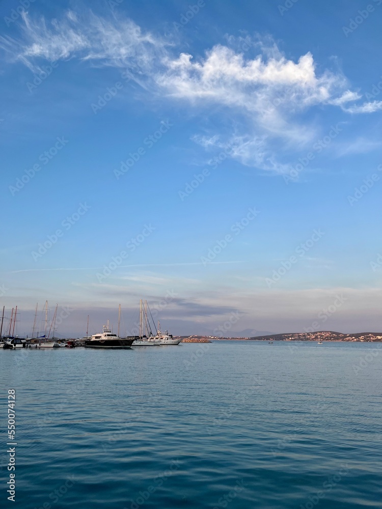 Small yachts marina on the sea horizon, pastel colors sea horizon