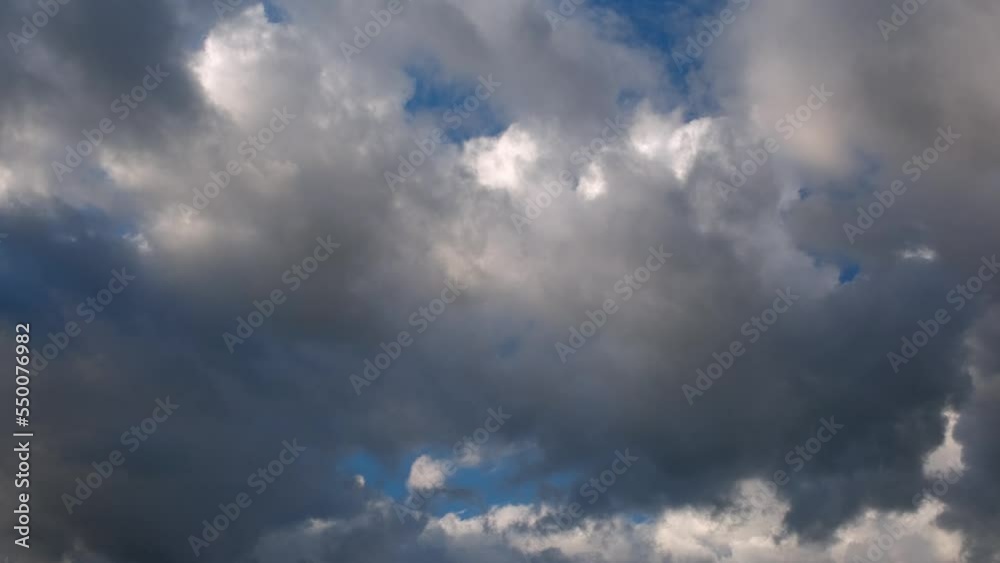 Blue Skies with White Fluffy Clouds Moving Left to Right Slowly Blue Skies with White Fluffy Clouds Moving Left to Right Slowly