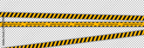 Yellow barricade tape with black diagonal stripes isolated on transparent background. Vector template of seamless barrier line. Under construction ribbon