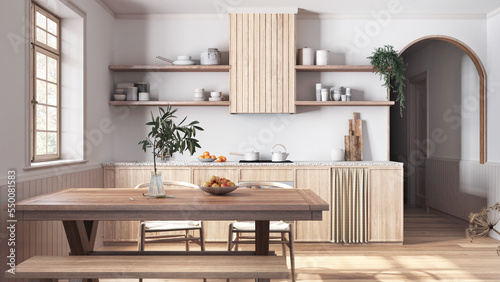 Bleached wooden country kitchen and dining room in white and beige tones. Cabinets and table with chair. Parquet floor. Farmhouse interior design