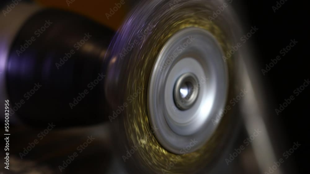 a round metal brush rotates on a drill. metal processing nozzle a round metal brush rotates on a drill. metal processing nozzle