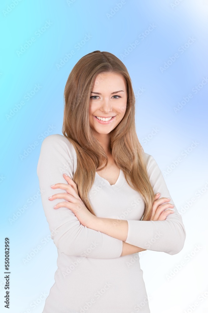 Happy young woman posing on background Happy young woman posing on background