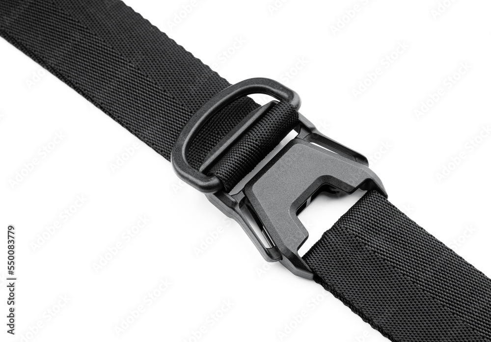 Black plastic fastener fastex for the manufacture of backpacks. Plastic belt clip, carbine - buckle, length adjusters on bag or backpack strap. Fastex buckle on textile belt on white background. Black plastic fastener fastex for the manufacture of backpacks. Plastic belt clip, carbine - buckle, length adjusters on bag or backpack strap. Fastex buckle on textile belt on white background.