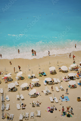 View of people crowd relaxing on beach Kaputas, Turkey