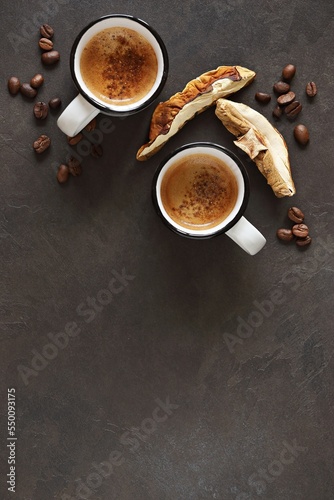 Mushroom espresso, coffee beans and dry mushrooms on a dark background. Selective focus