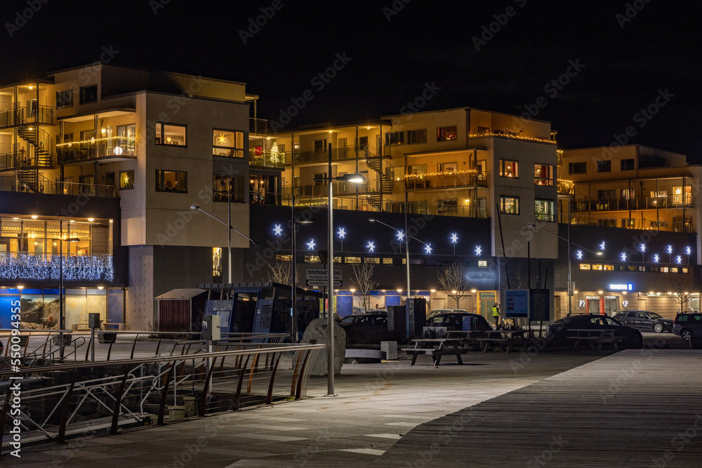Shopping center in Brønnøysund city.Light and colors in Brønnøysund harbor area, Nordland county, Norway, Europe	

