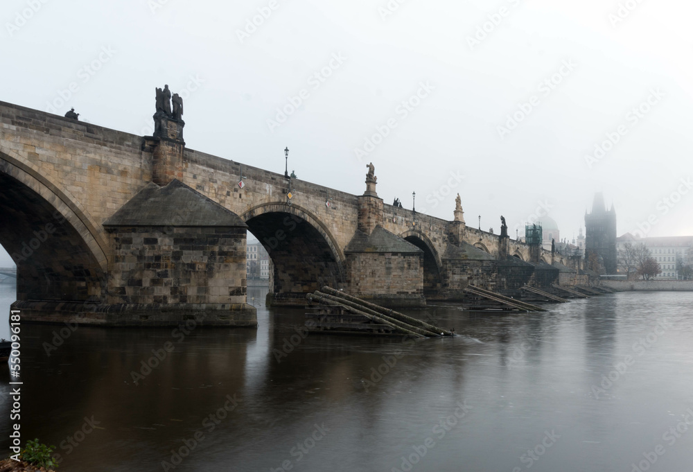 Early foggy morning on Charles bridge Prague, Czech republic