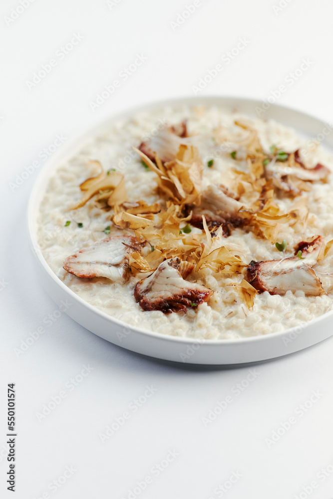 pearl barley porridge with parmesan, eel and tuna shavings