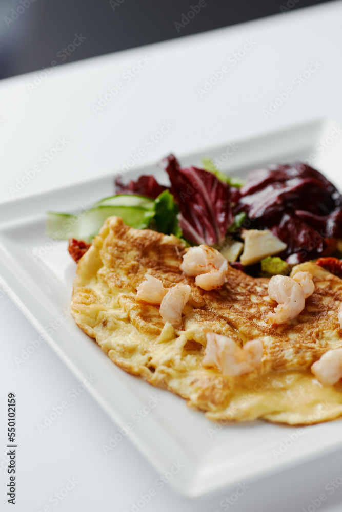 omelet with herbs and shrimps