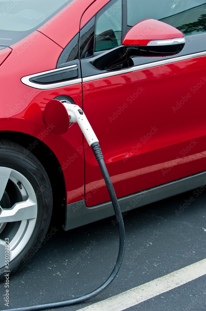 Close up of a Chevrolet Volt car getting recharged. Close up of a Chevrolet Volt car getting recharged.