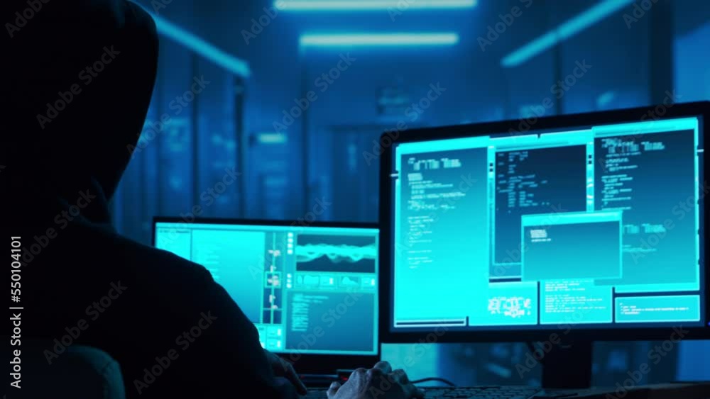 Computer Hacker in Hoodie. Obscured Dark Face. Hacker Attack, Virus Infected Software, Dark Web and Cyber Security concept