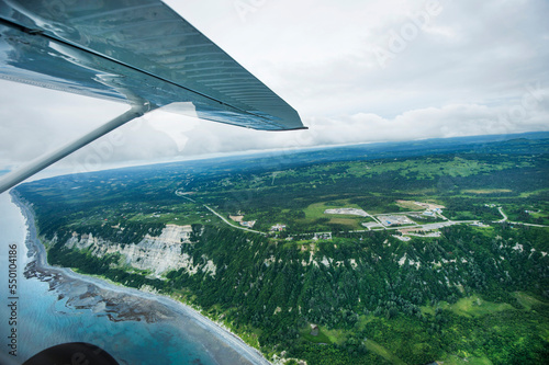 Aircraft wing during flight, Homer, Alaska, USA photo