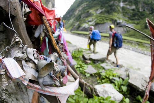 Couple hiking along river, India photo