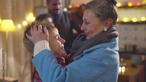 Happy big family meeting each other at cozy home for celebrating Christmas or New Year. Realtime