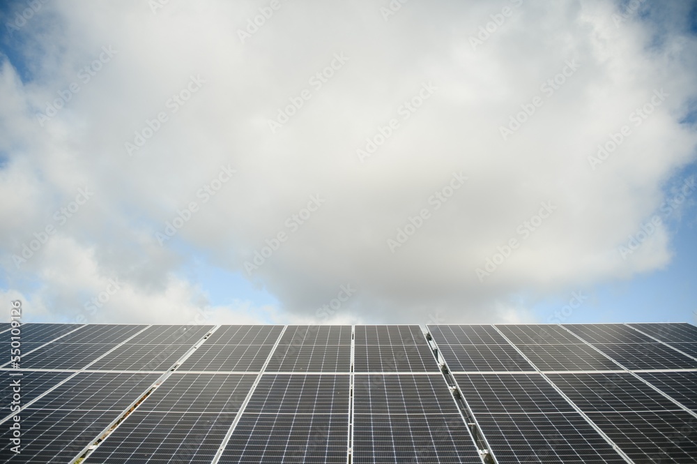 Solar Panels Against The Deep Blue Sky