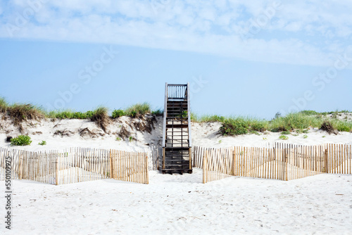 A staircase leads down to the beach in the Hamptons in New York state. photo