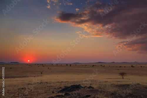 Sunset over the savannah. Beautiful landscape. Solitaire  Namibia.