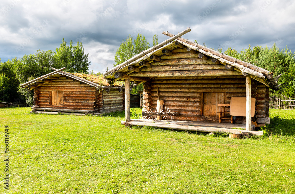 Ancient slavic village. X century settlement, typical houses reconstruction Ancient slavic village. X century settlement, typical houses reconstruction
