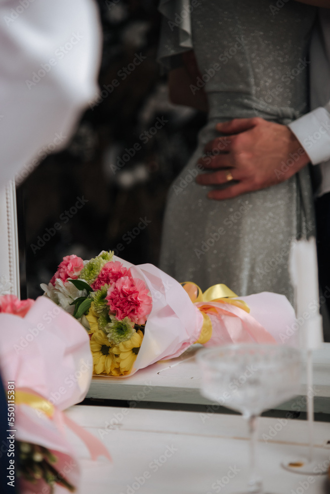 the Hands of brides with gold wedding rings close up the Hands of brides with gold wedding rings close up