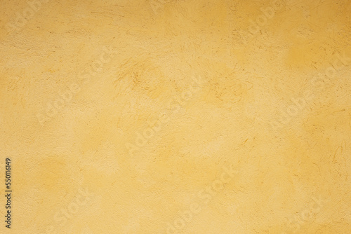 textured gold background. cement wall