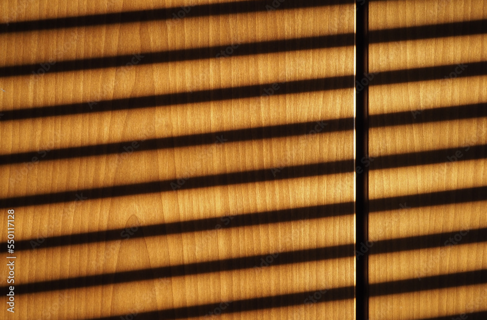 blinds shadow on wooden wall background blinds shadow on wooden wall background
